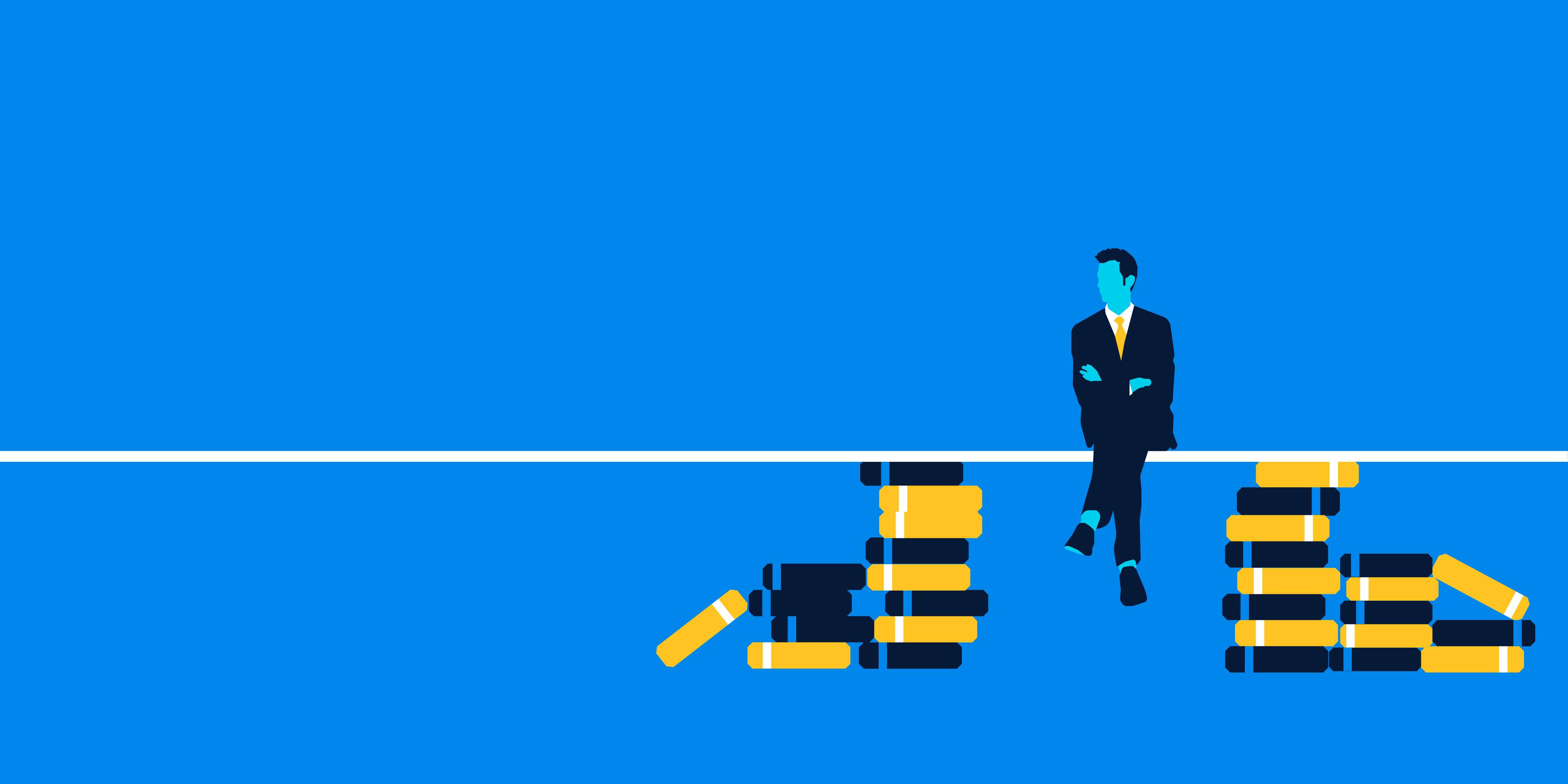 man sitting between two piles of coins