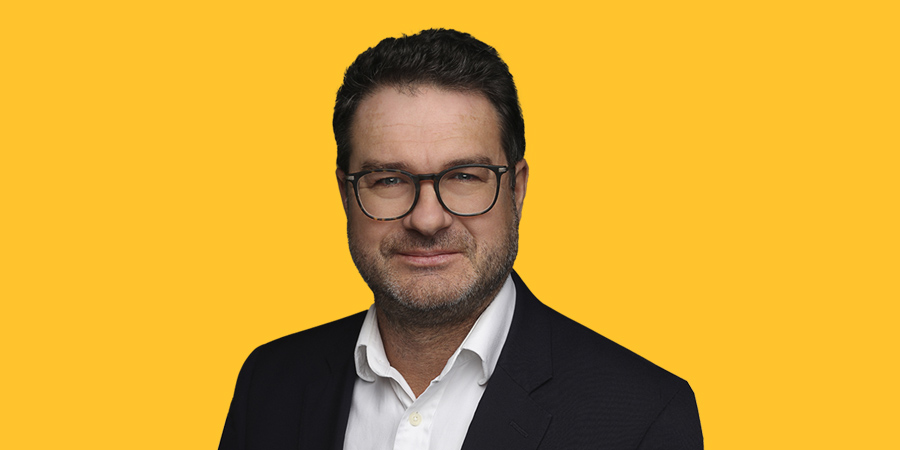 Headshot of Justin Thomson, head of the Investment Institute and CIO