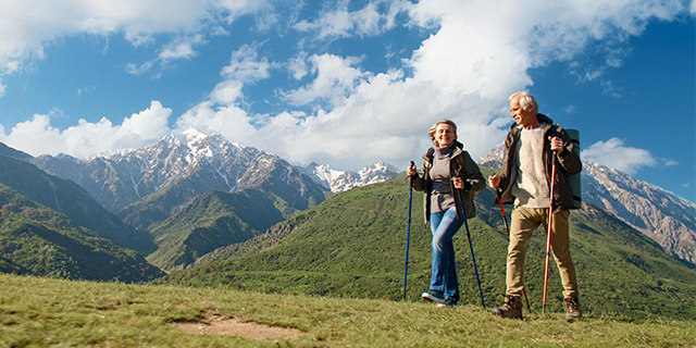 Photo of a couple hiking.