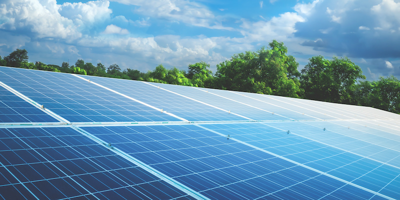 solar panels with sun and perfect sky