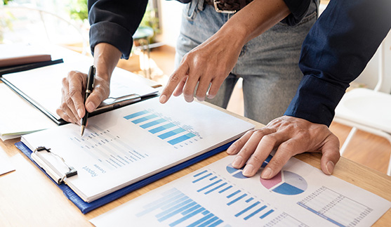 Business People Meeting to analyse and discuss and brainstorming the financial report chart data in office, Financial advisor teamwork and accounting concept