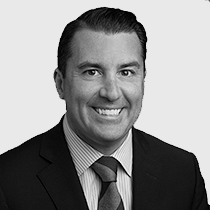 A black & white headshot of Senior Relationship Manager, Brian Rapino